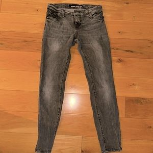 These Miss Sixty jeans are an acid-washed grey with a low rise fit in size 28